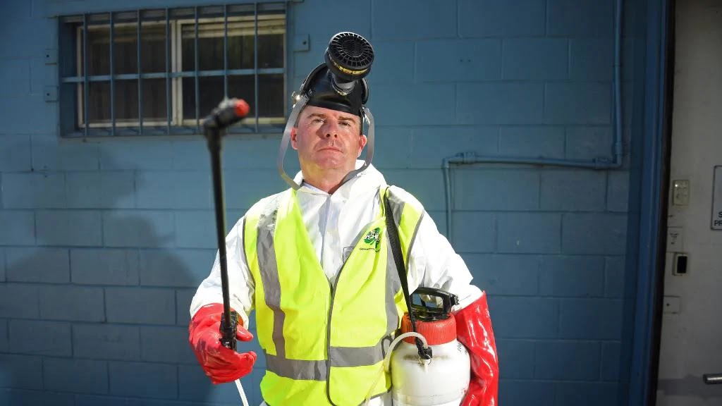 man getting ready to clean contaminated building